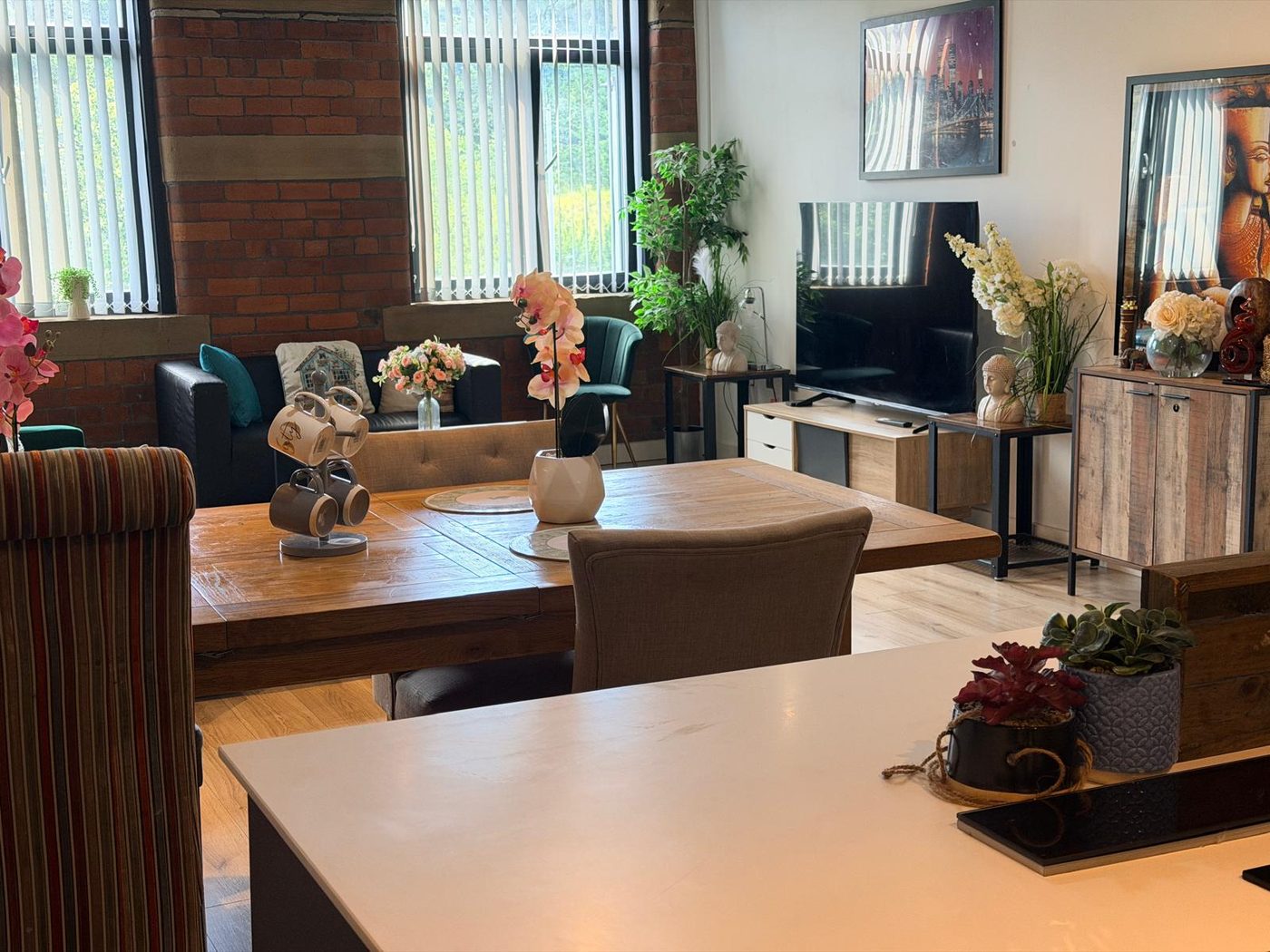 Executive serviced apartment — open-plan living and dining area